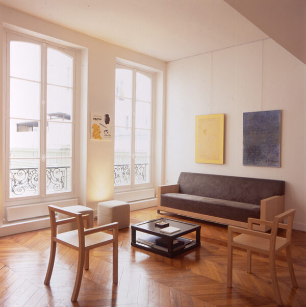 Loft Paris - Séjour avec Canapé et Chaises - Transformation anciens bureaux